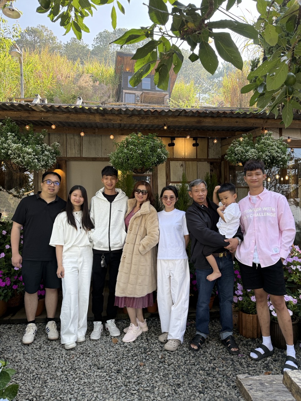Everyone standing in front of a coffee shop